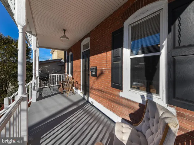 a lobby with furniture and window