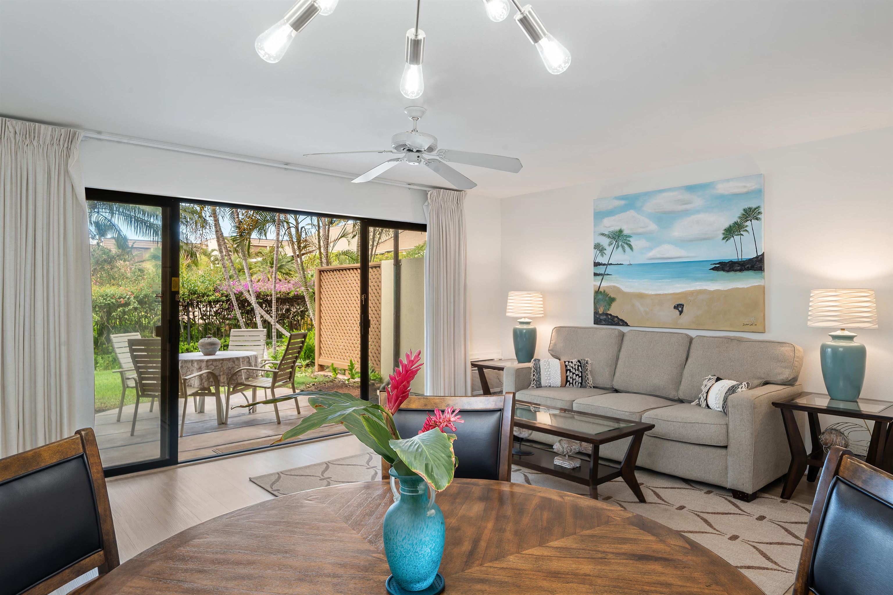 2777 South Kihei Road, Unit K102 Kihei, HI 96753 - Photo 1 of 47 a living room with furniture and a large window