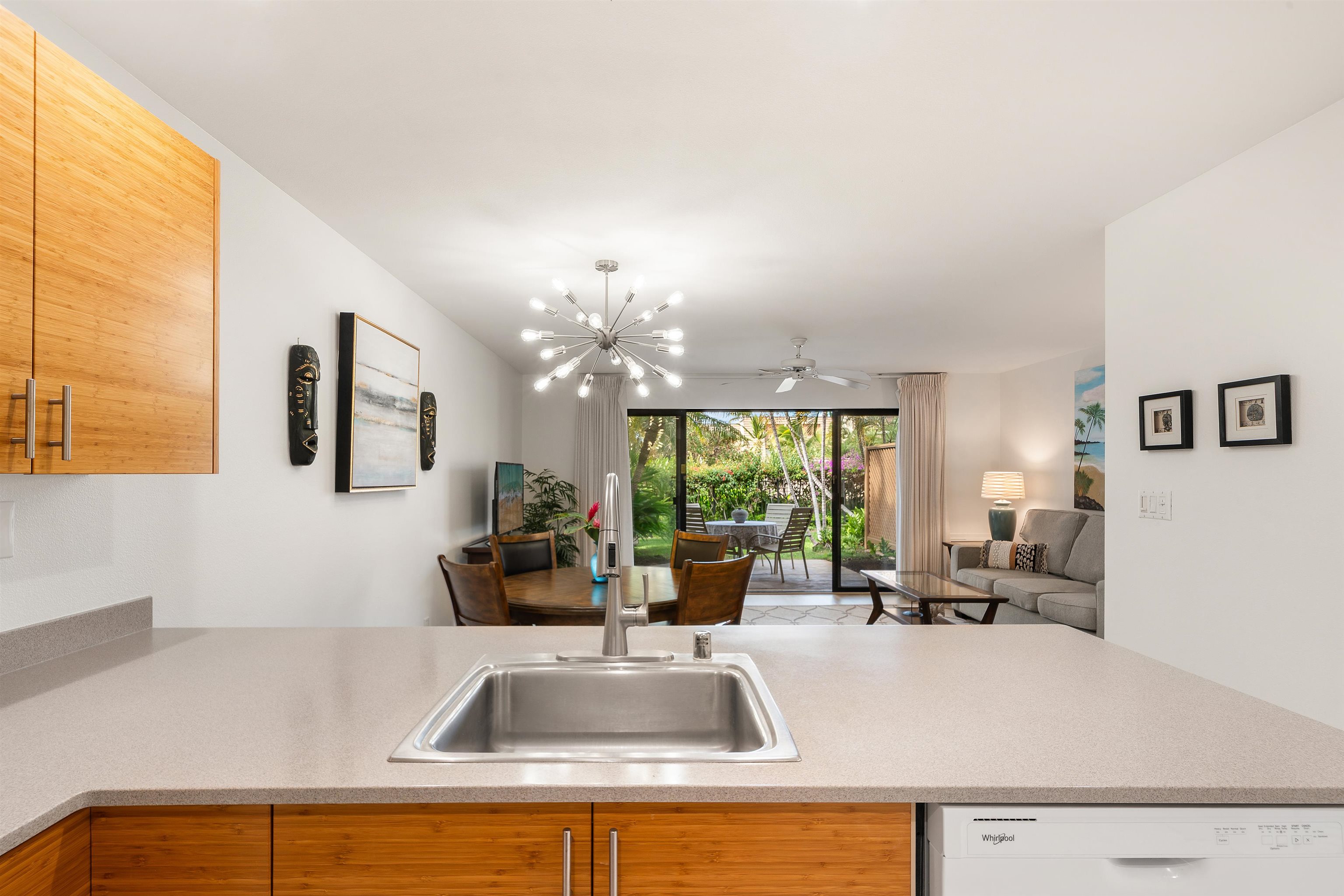 2777 South Kihei Road, Unit K102 Kihei, HI 96753 - Photo 18 of 47 a kitchen with a sink and a refrigerator