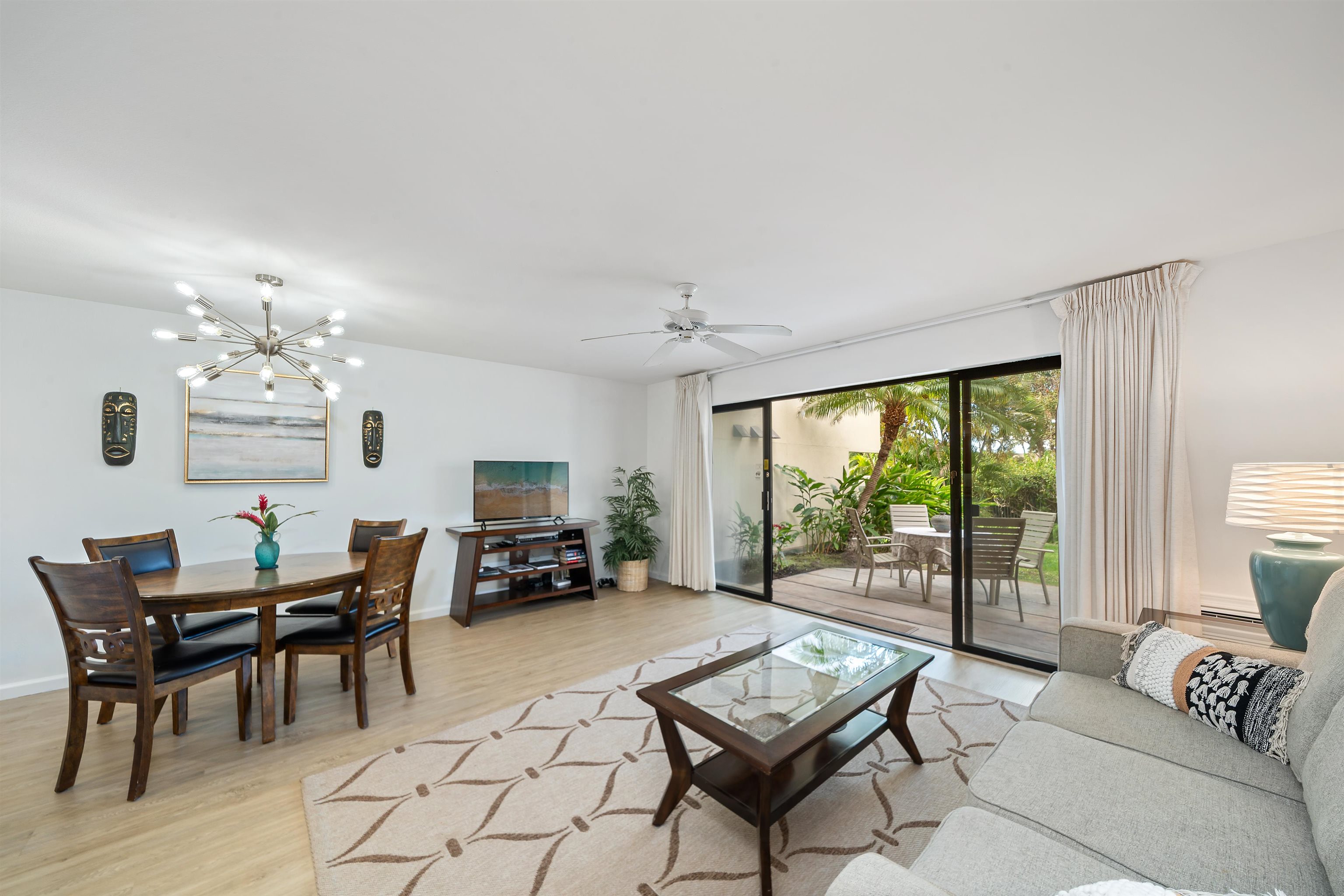 2777 South Kihei Road, Unit K102 Kihei, HI 96753 - Photo 22 of 47 a living room with furniture and a large window