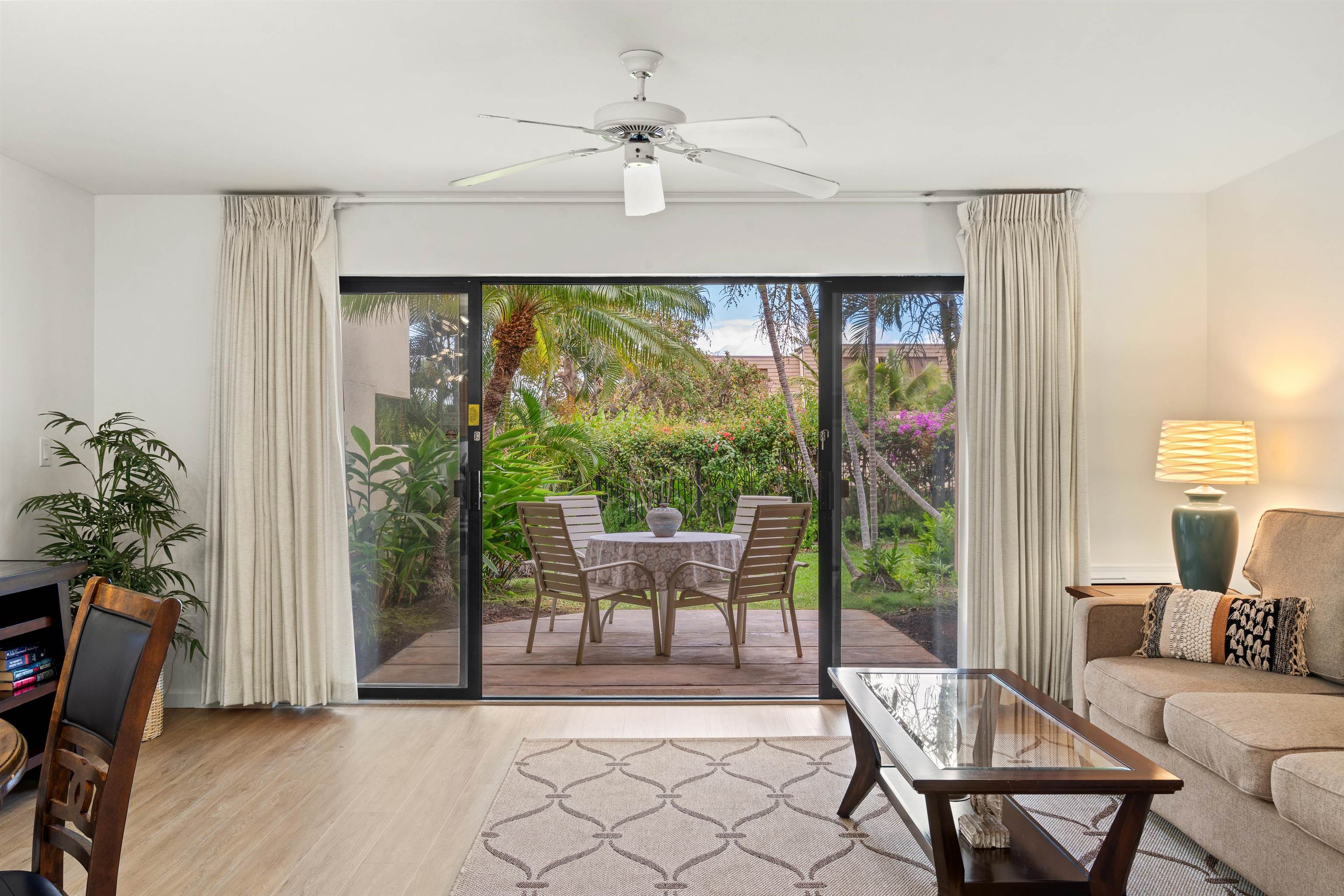 2777 South Kihei Road, Unit K102 Kihei, HI 96753 - Photo 24 of 47 a living room with furniture and a window