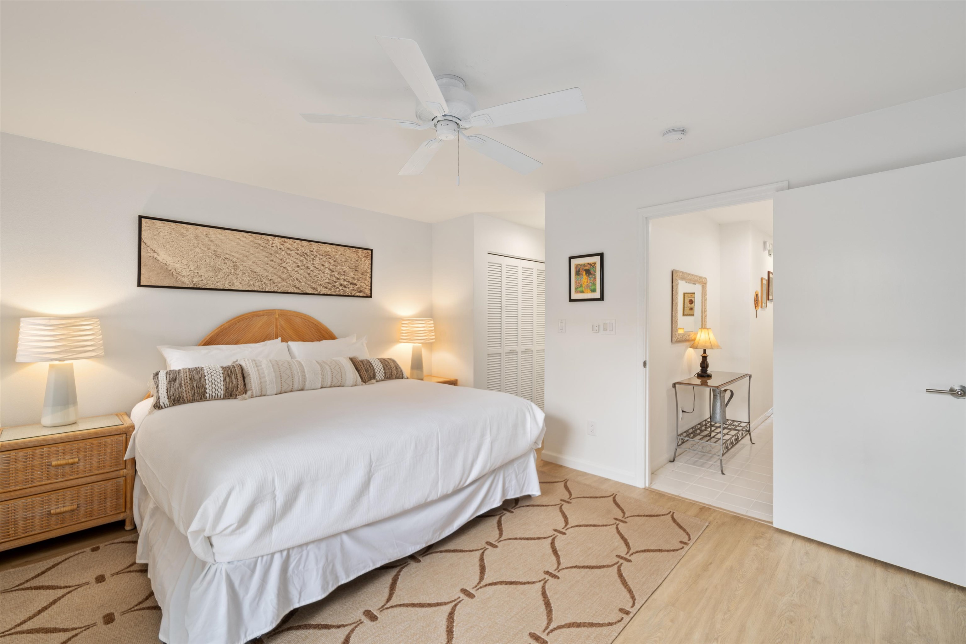 2777 South Kihei Road, Unit K102 Kihei, HI 96753 - Photo 31 of 47 a bedroom with a bed and a table