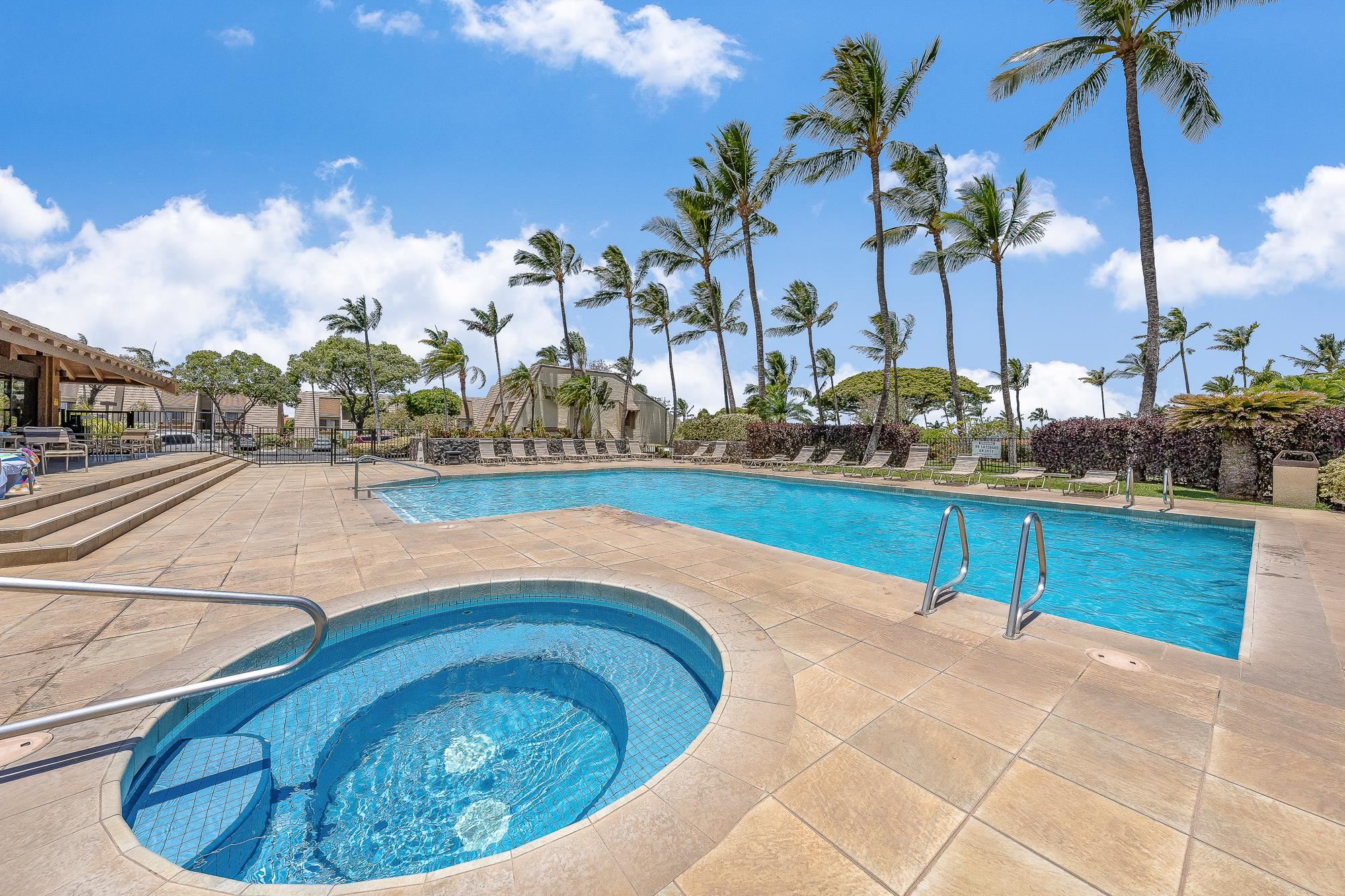 2777 South Kihei Road, Unit K102 Kihei, HI 96753 - Photo 42 of 47 a swimming pool with outdoor seating and barbeque oven