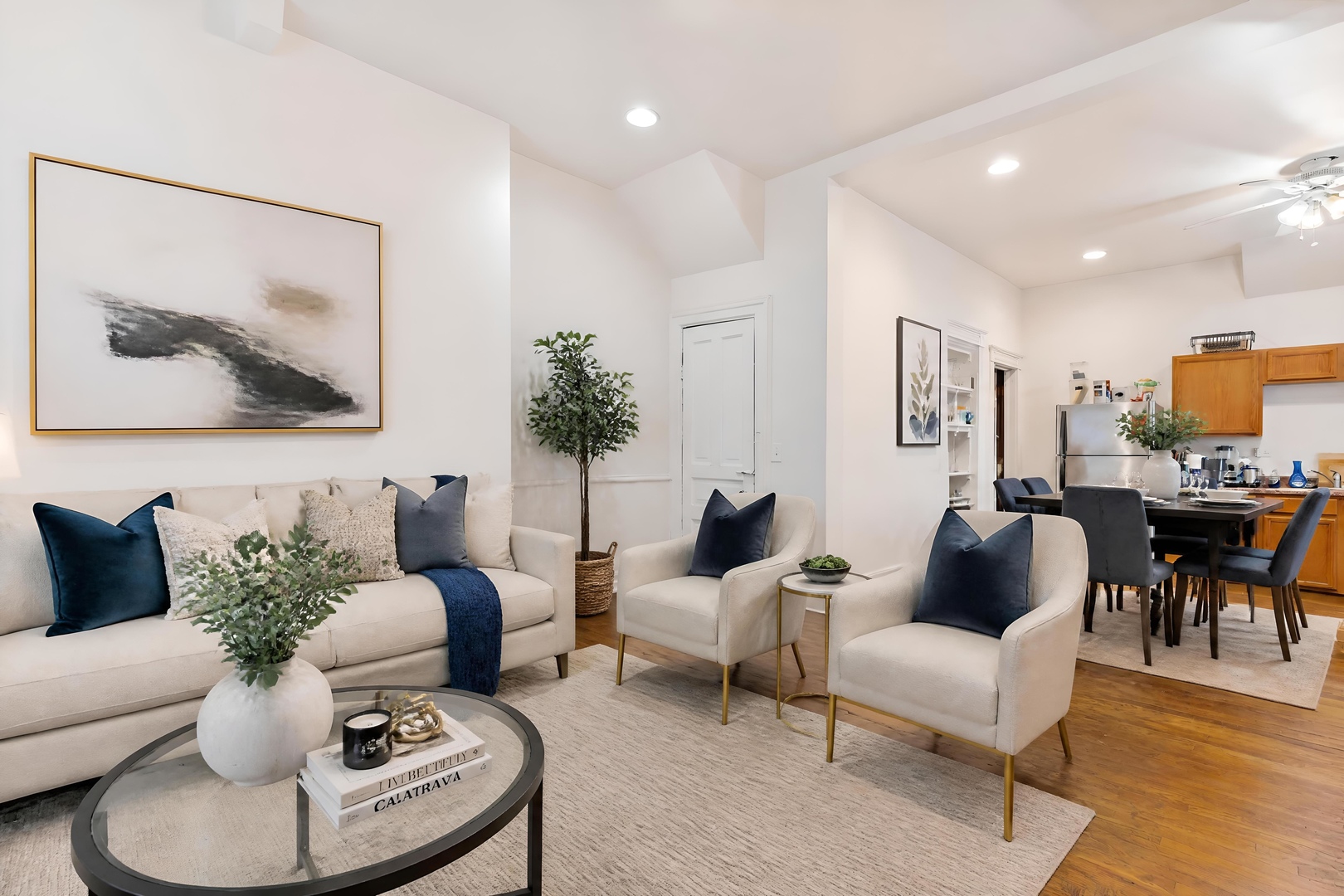 1132 East 44th Street Chicago, IL 60653 - Photo 2 of 23 a living room with furniture and a painting on the wall