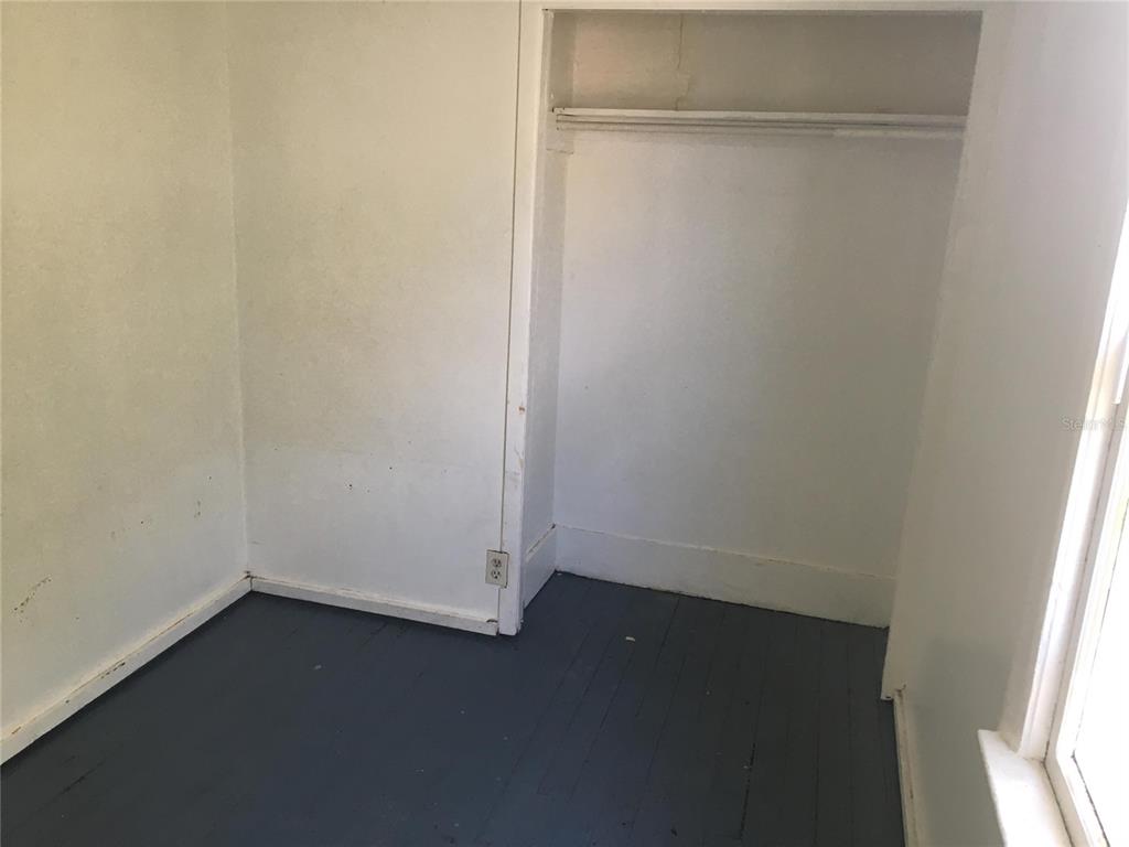 124 Daytona Avenue, Unit 2 Holly Hill, FL 32117 - Photo 5 of 6 a view of an empty room