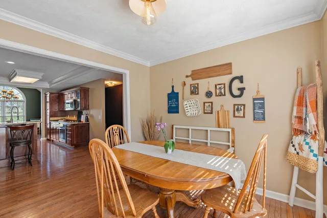 a kitchen with stainless steel appliances granite countertop a sink and cabinets