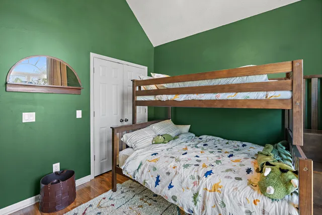 a view of a porch with furniture and backyard of the house