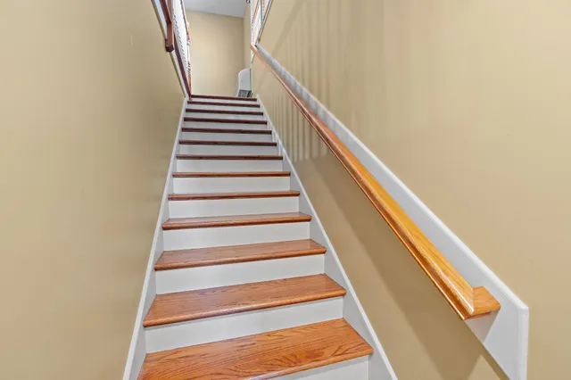a view of a house with pool porch and sitting area