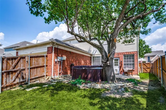 a backyard of a house with seating space