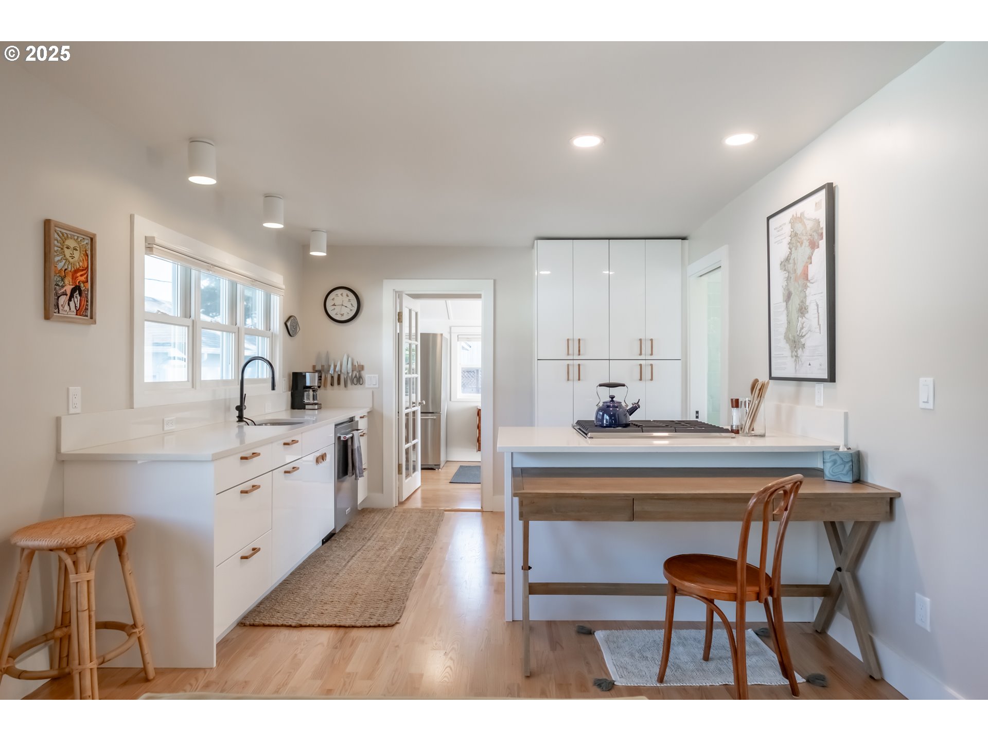 206 East 5th Street Newberg, OR 97132 - Photo 11 of 48 a large kitchen with a table and chairs