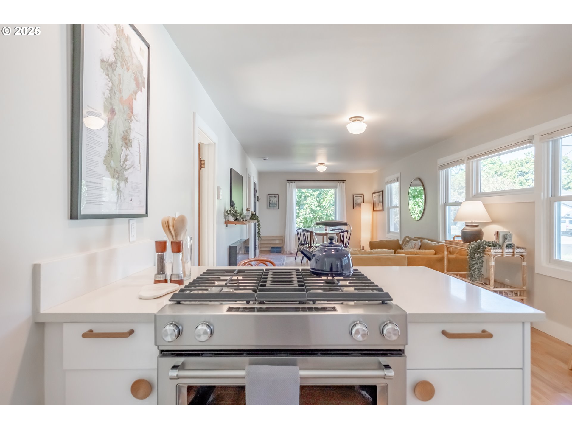 206 East 5th Street Newberg, OR 97132 - Photo 14 of 48 a kitchen with a stove a sink and a window