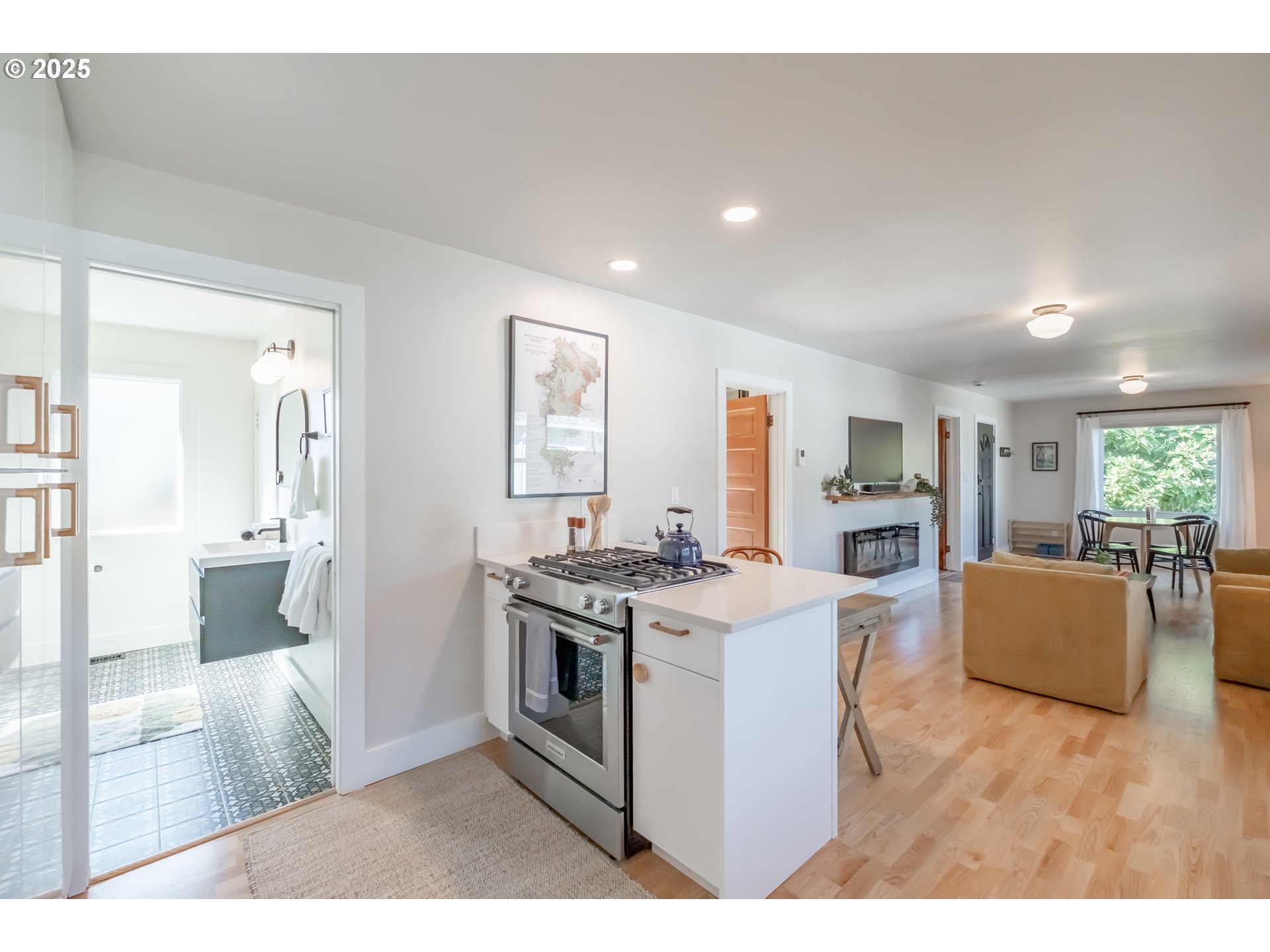 206 East 5th Street Newberg, OR 97132 - Photo 15 of 48 a open kitchen with cabinets a stove and a refrigerator
