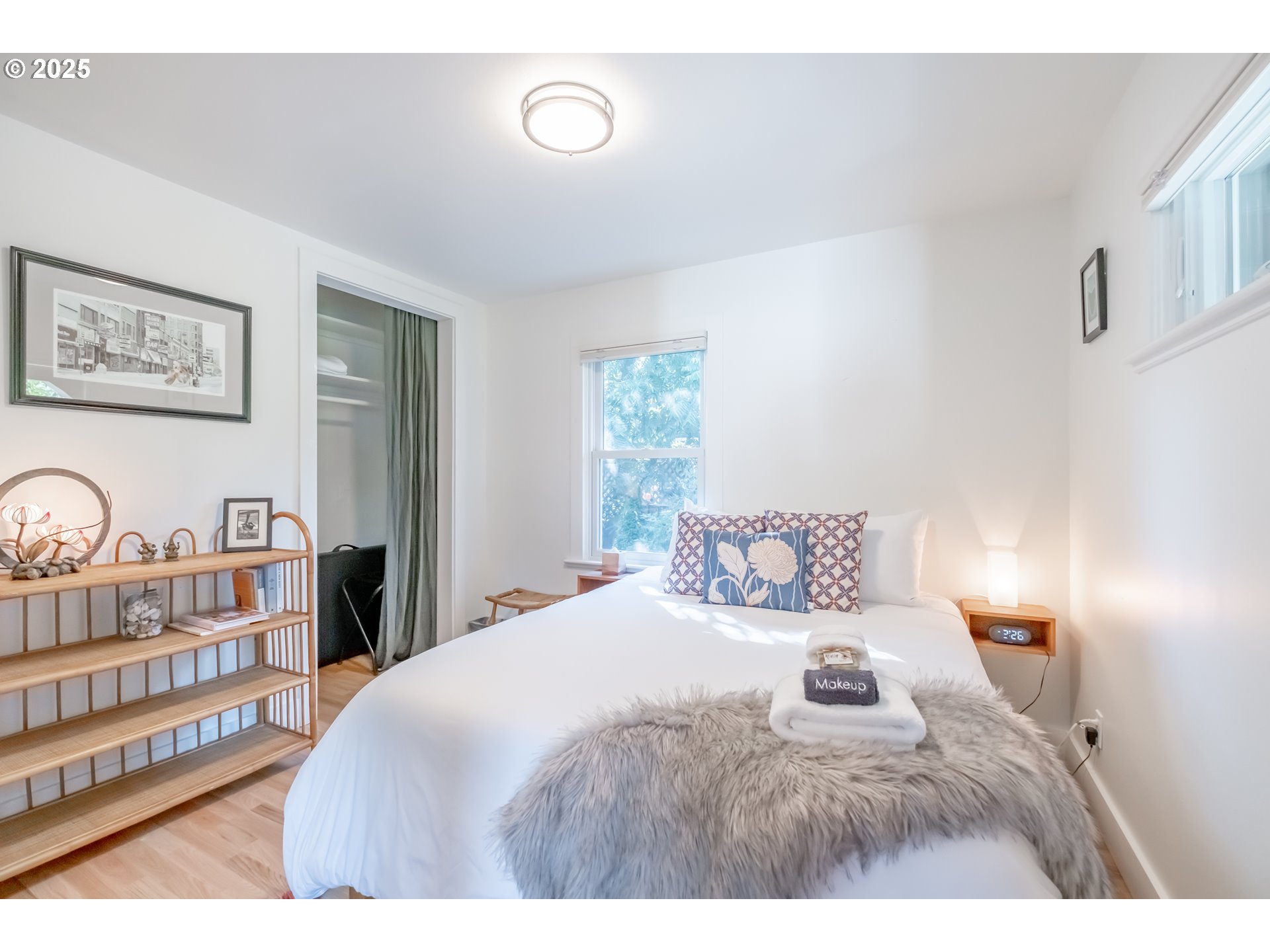 206 East 5th Street Newberg, OR 97132 - Photo 24 of 48 a bedroom with a bed and a night stand