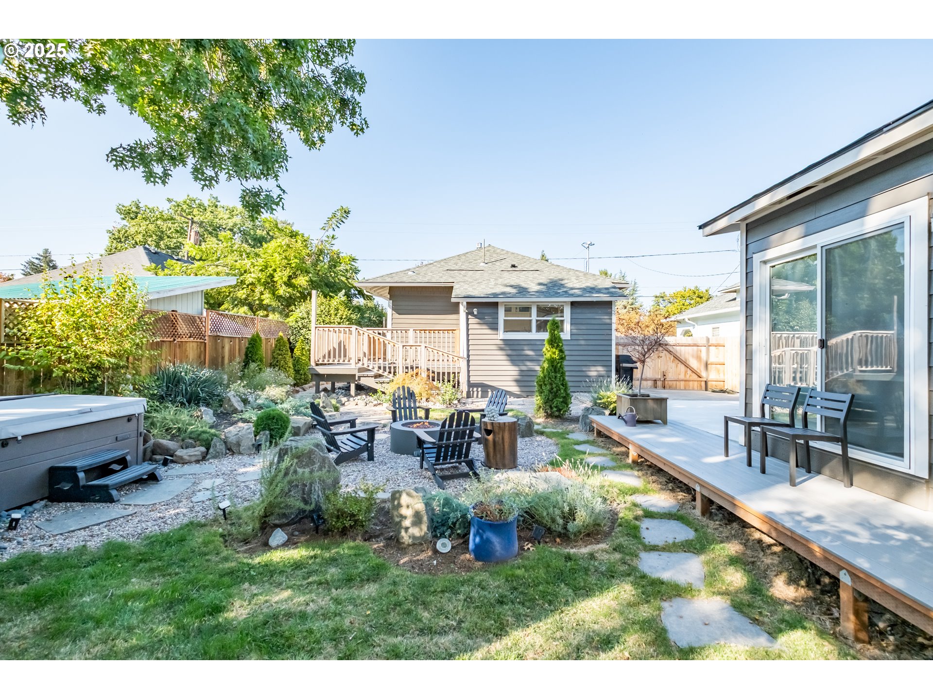 206 East 5th Street Newberg, OR 97132 - Photo 40 of 48 a view of a house with backyard porch and sitting area