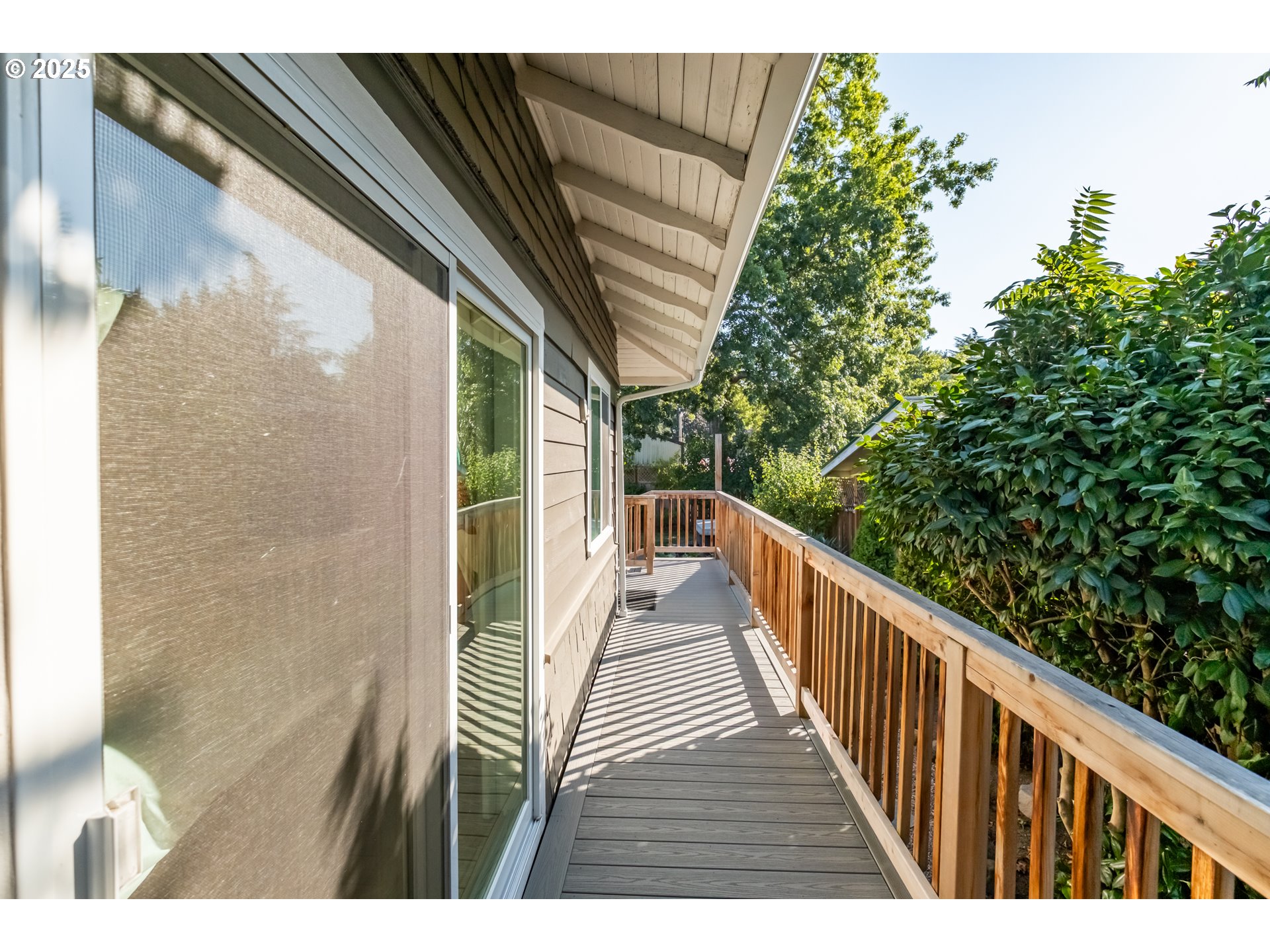206 East 5th Street Newberg, OR 97132 - Photo 46 of 48 a view of balcony with wooden floor and fence