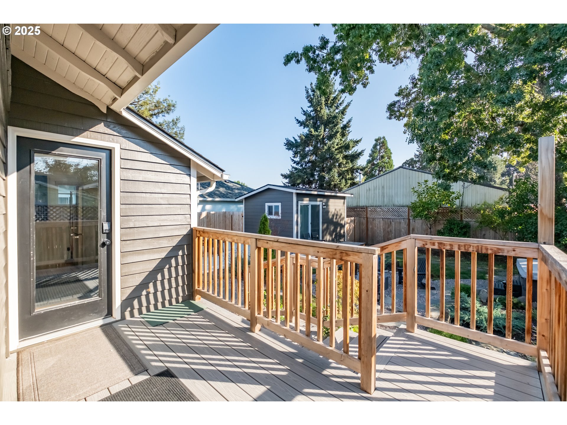 206 East 5th Street Newberg, OR 97132 - Photo 47 of 48 a view of a two chairs on the deck