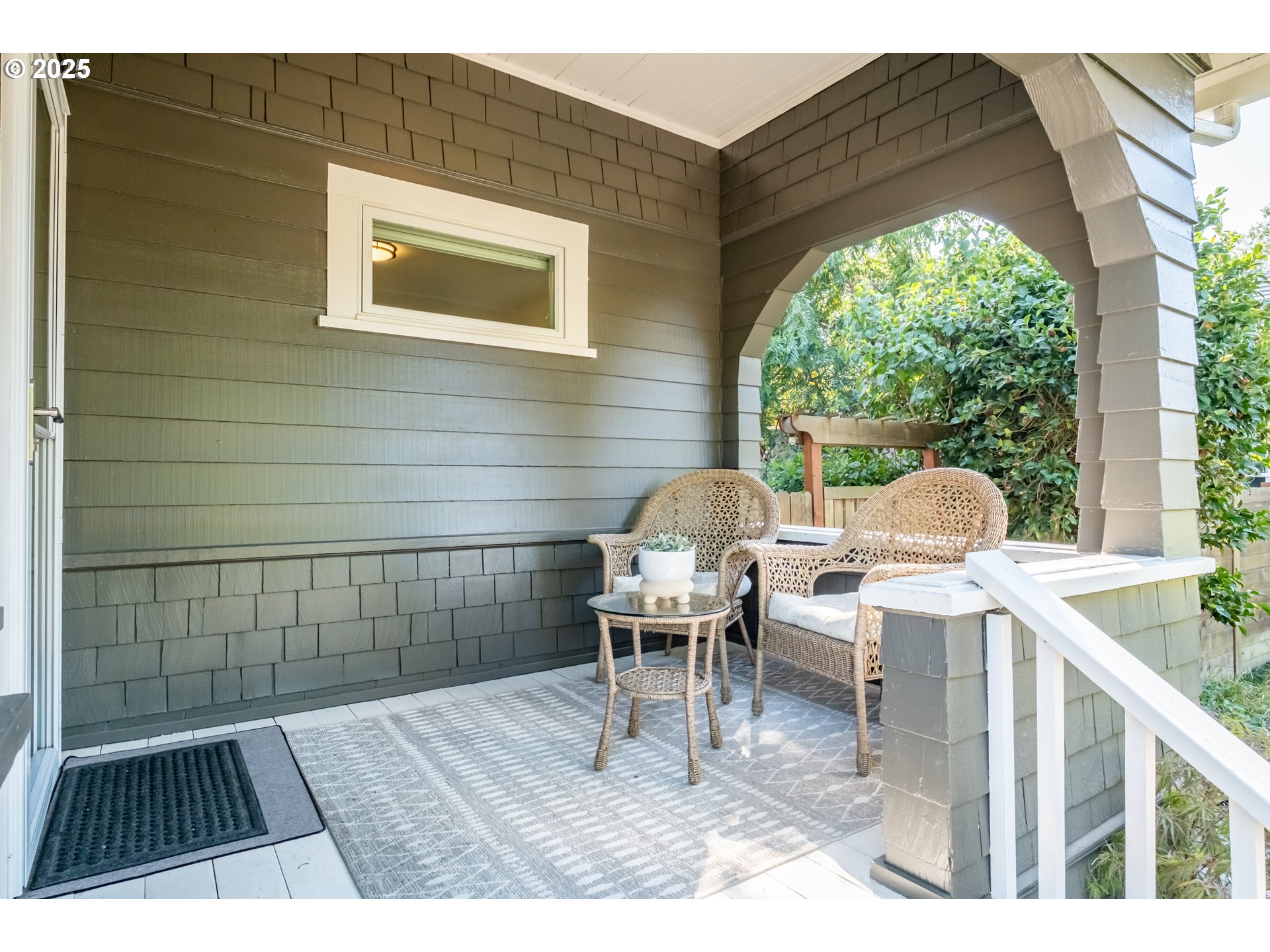 206 East 5th Street Newberg, OR 97132 - Photo 5 of 48 a balcony with table and chairs