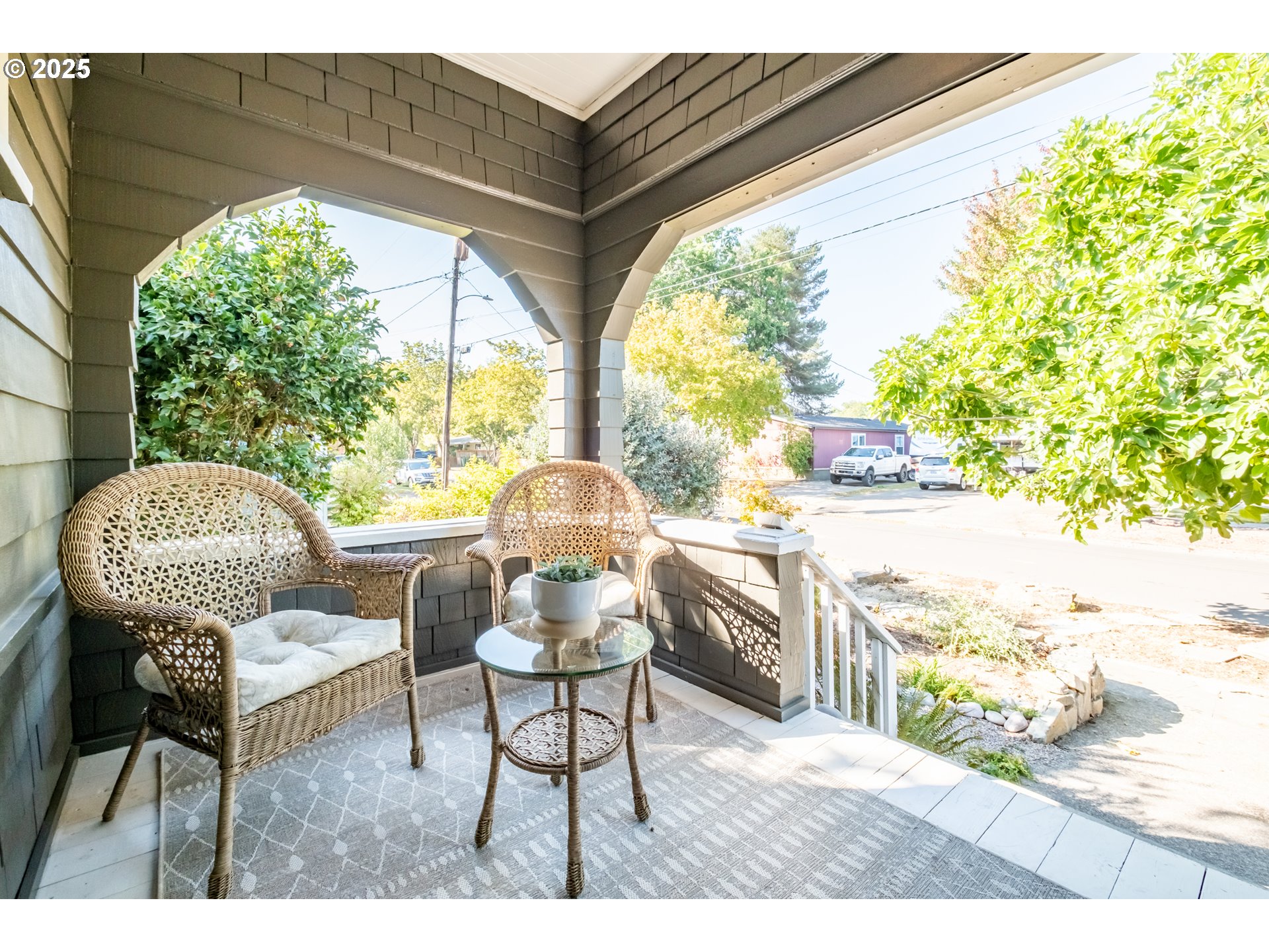 206 East 5th Street Newberg, OR 97132 - Photo 6 of 48 a view of a porch with furniture and a yard