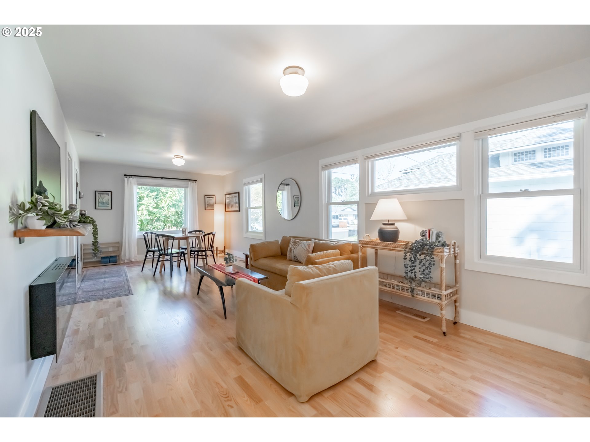 206 East 5th Street Newberg, OR 97132 - Photo 9 of 48 a living room with furniture and a table