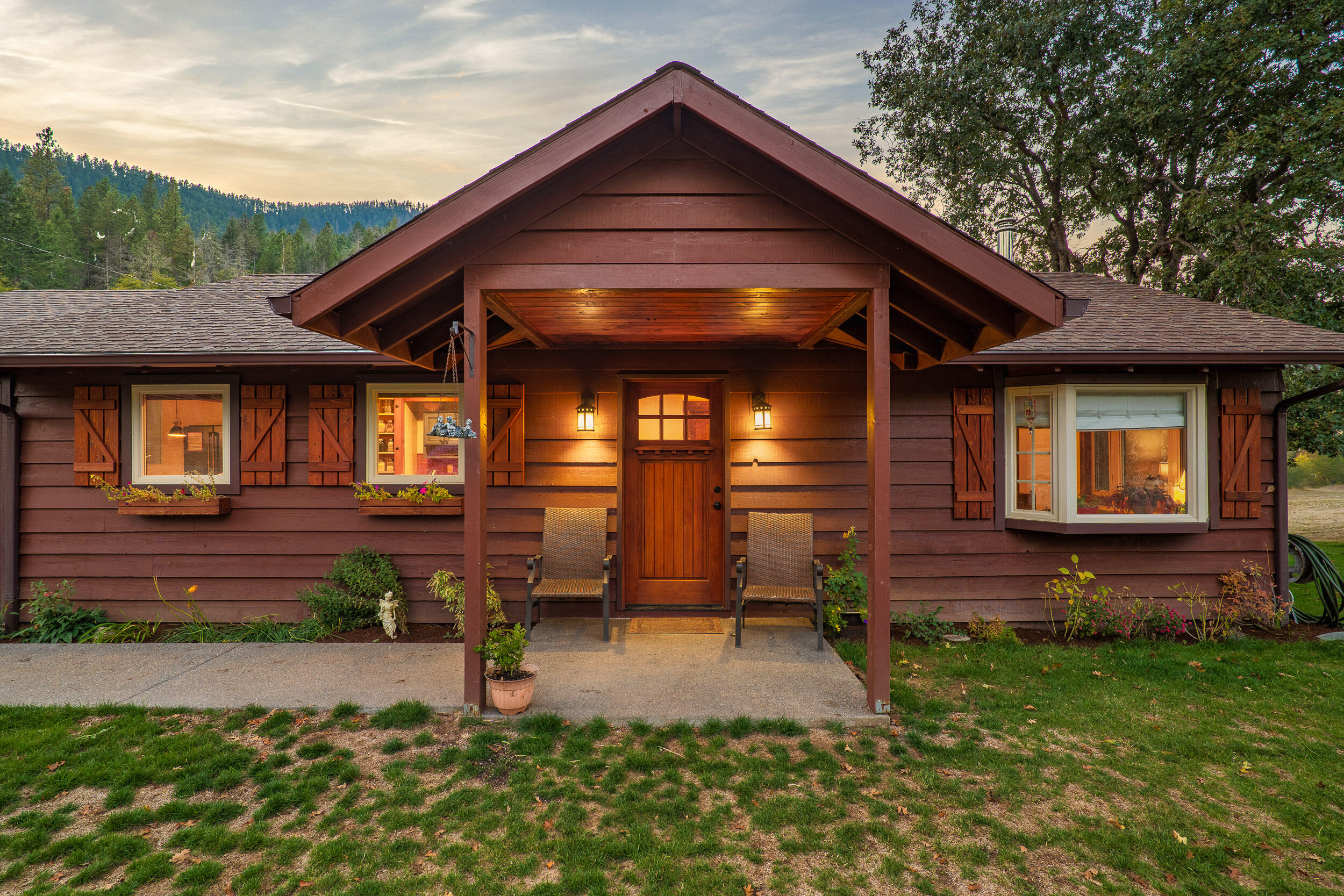 3732-3786 Little Applegate Road Jacksonville, OR 97530 - Photo 11 of 72 a front view of a house with garden