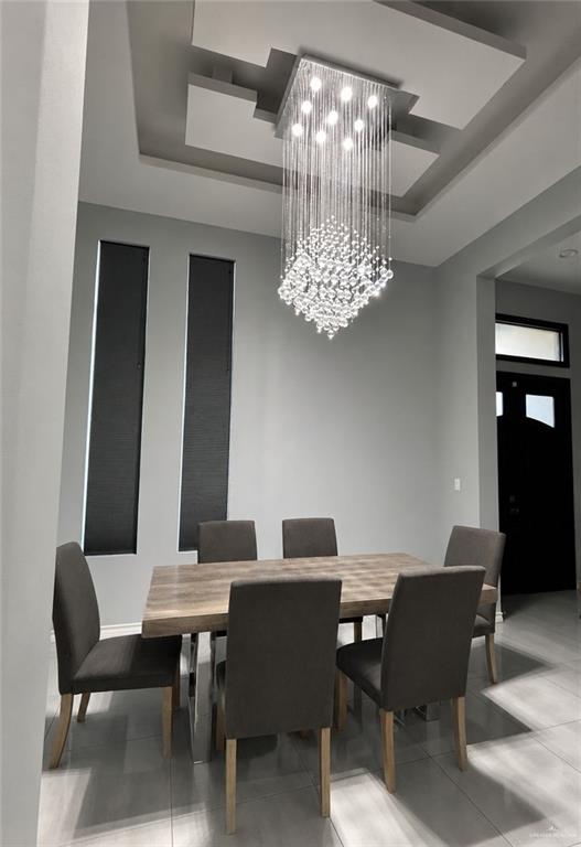 1310 Thompson Road Mission, TX 78573 - Photo 4 of 7 Recessed ceiling with an elaborate crystal chandelier