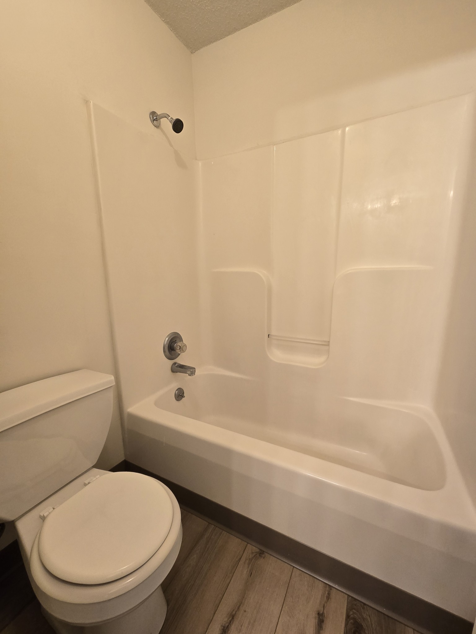 237 State Line Road Oak Grove, KY 42262 - Photo 18 of 20 a bathroom with a toilet and a bath tub