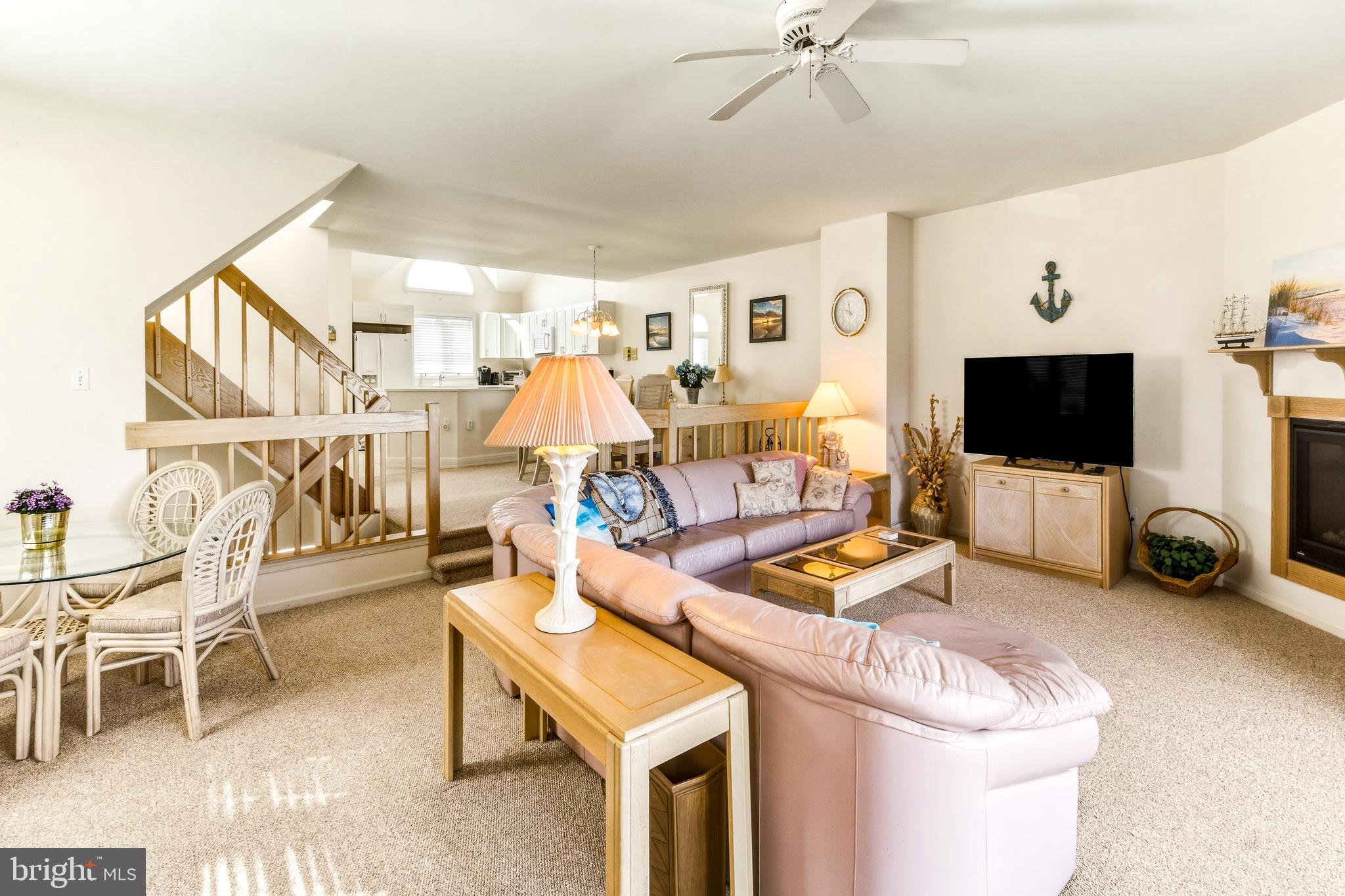 301 Gull Cove Brigantine, NJ 08203 - Photo 22 of 40 a living room with furniture and a flat screen tv