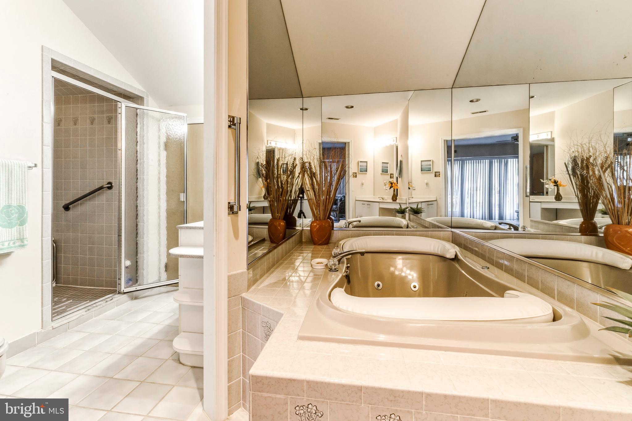 301 Gull Cove Brigantine, NJ 08203 - Photo 33 of 40 a room with a sink and a large mirror