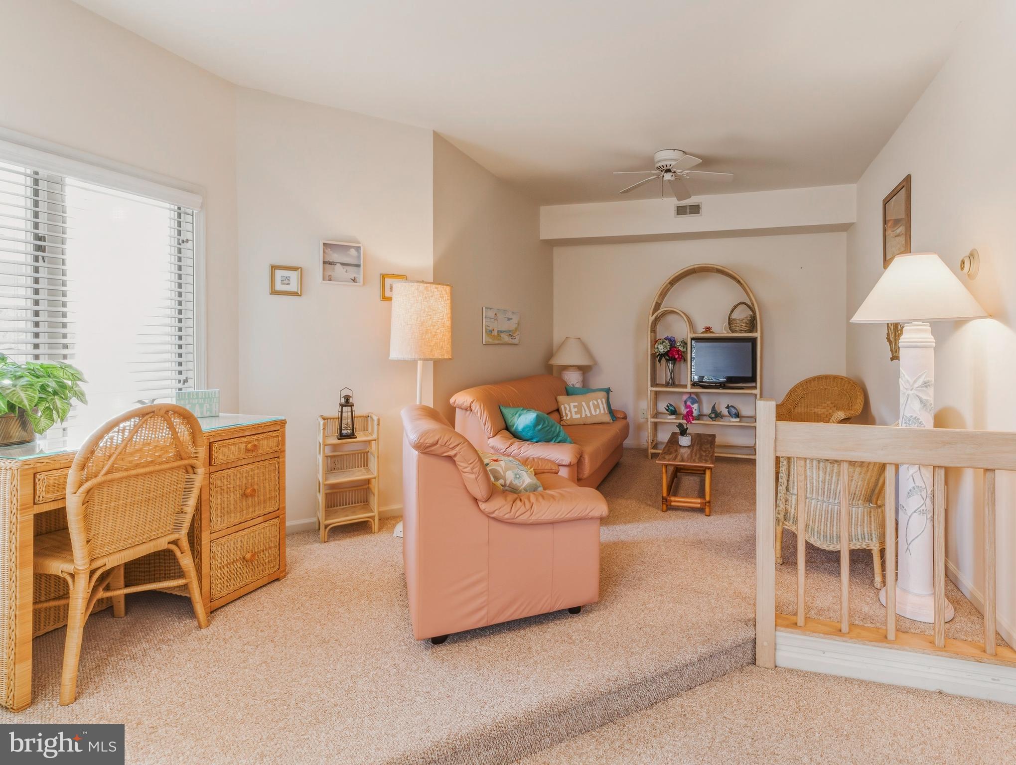 301 Gull Cove Brigantine, NJ 08203 - Photo 4 of 40 a living room with furniture and a window