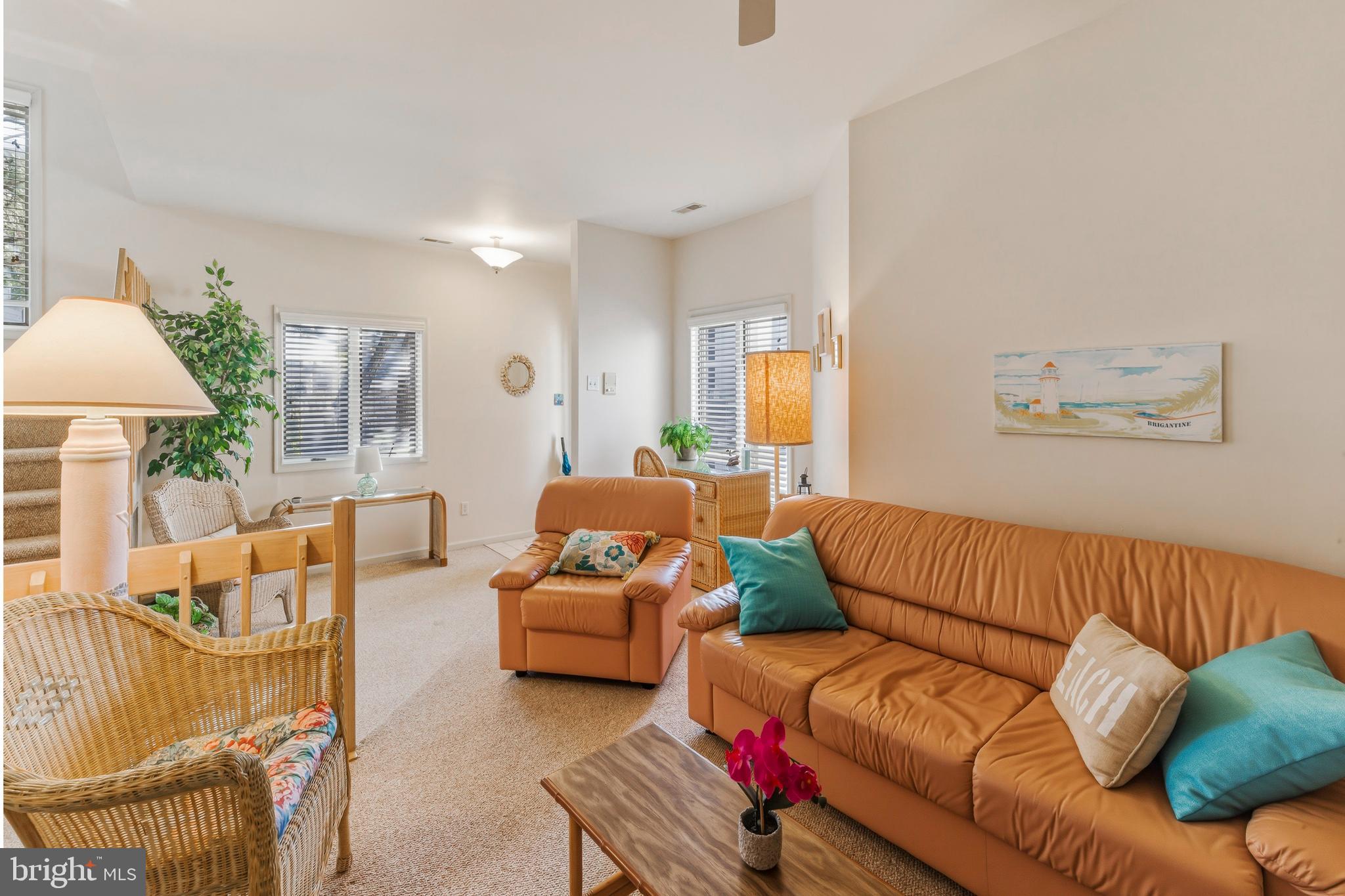 301 Gull Cove Brigantine, NJ 08203 - Photo 5 of 40 a living room with furniture and a couch