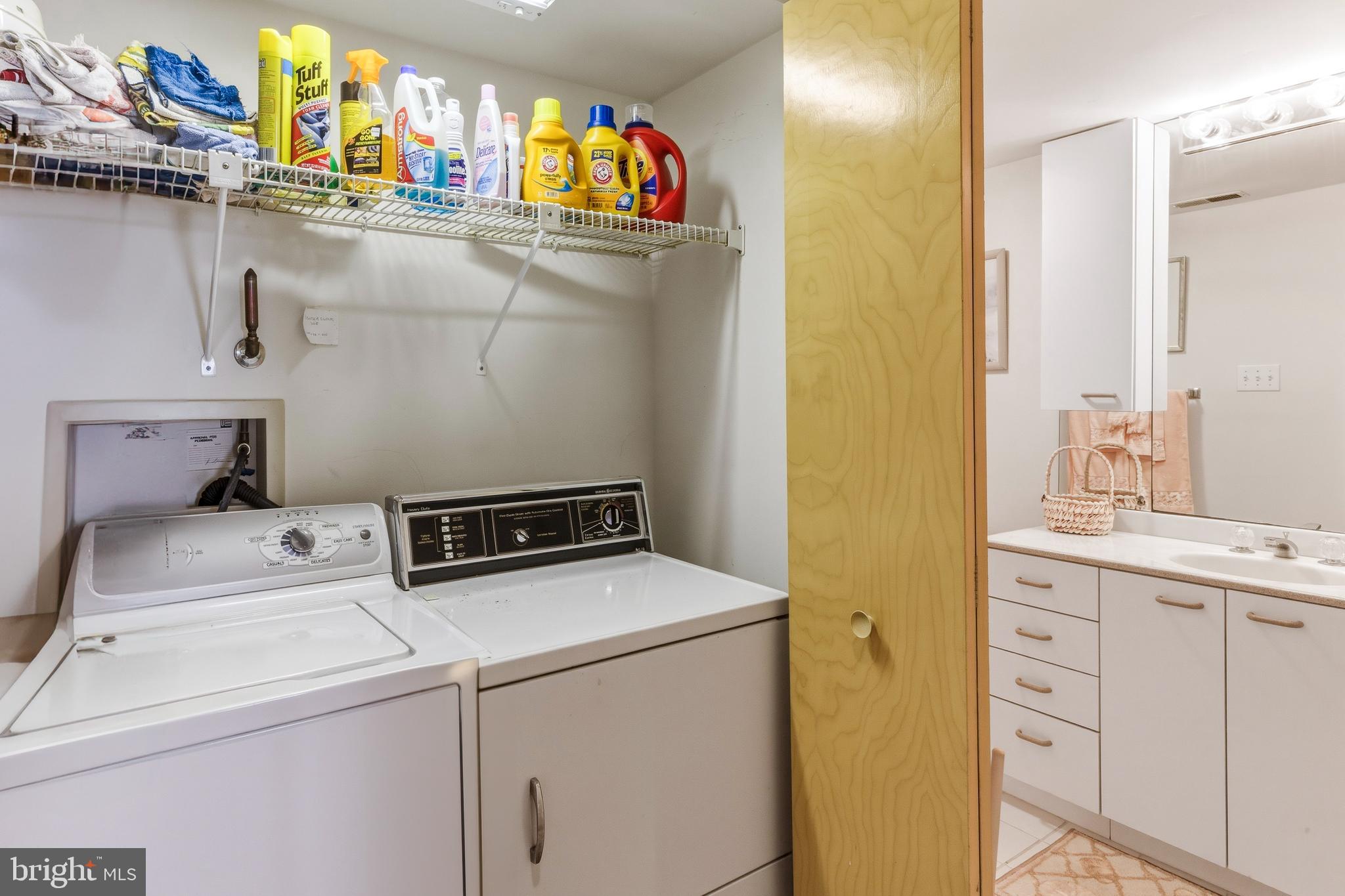 301 Gull Cove Brigantine, NJ 08203 - Photo 9 of 40 a utility room with dryer and washer