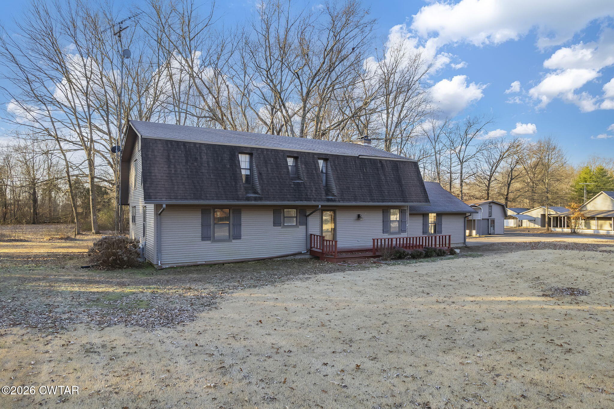 250 Collins Road Dresden, TN 38225 - Photo 36 of 43 a view of a house with a large tree and a big yard