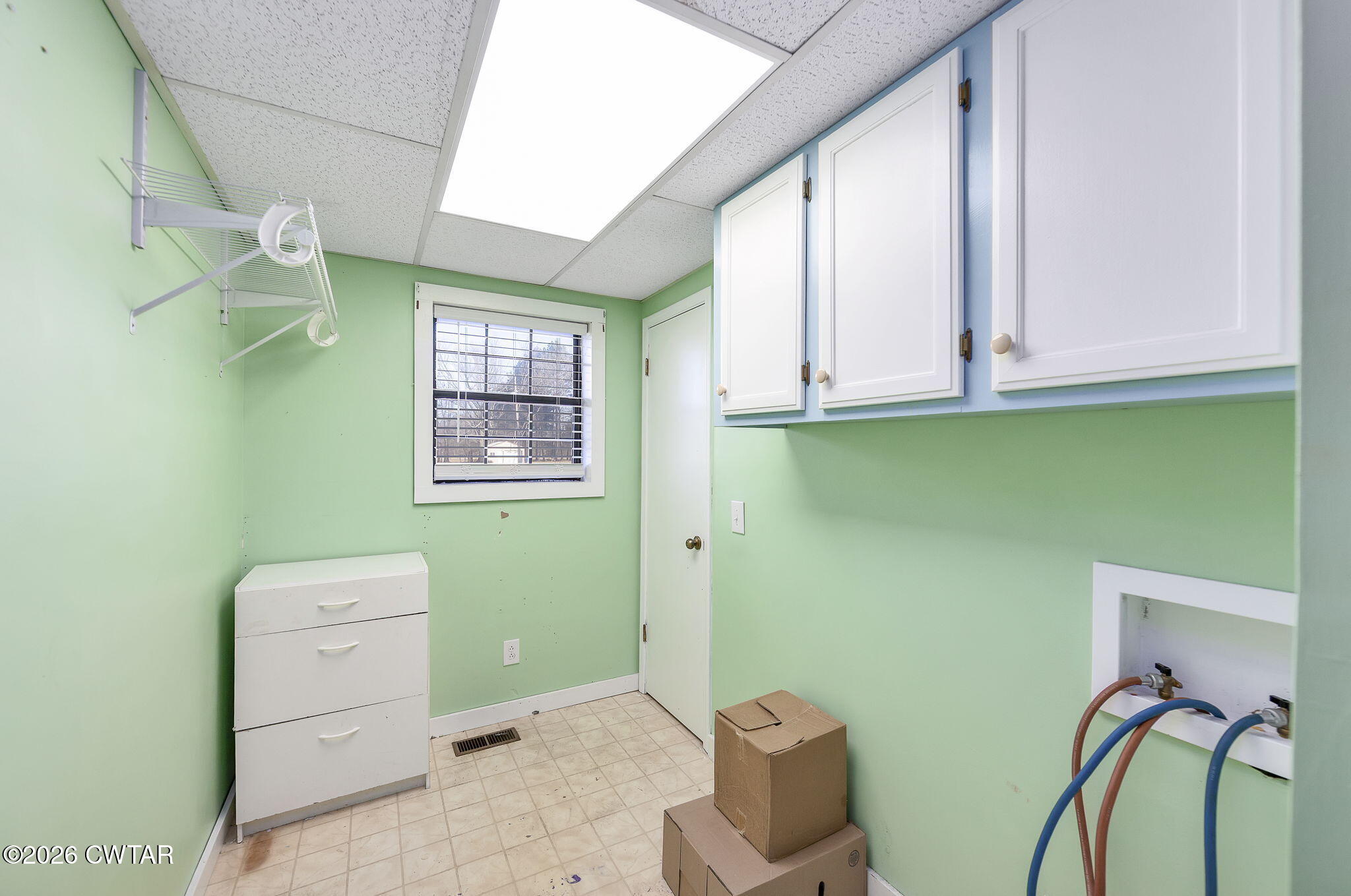 250 Collins Road Dresden, TN 38225 - Photo 5 of 43 a bathroom with a toilet sink and a mirror