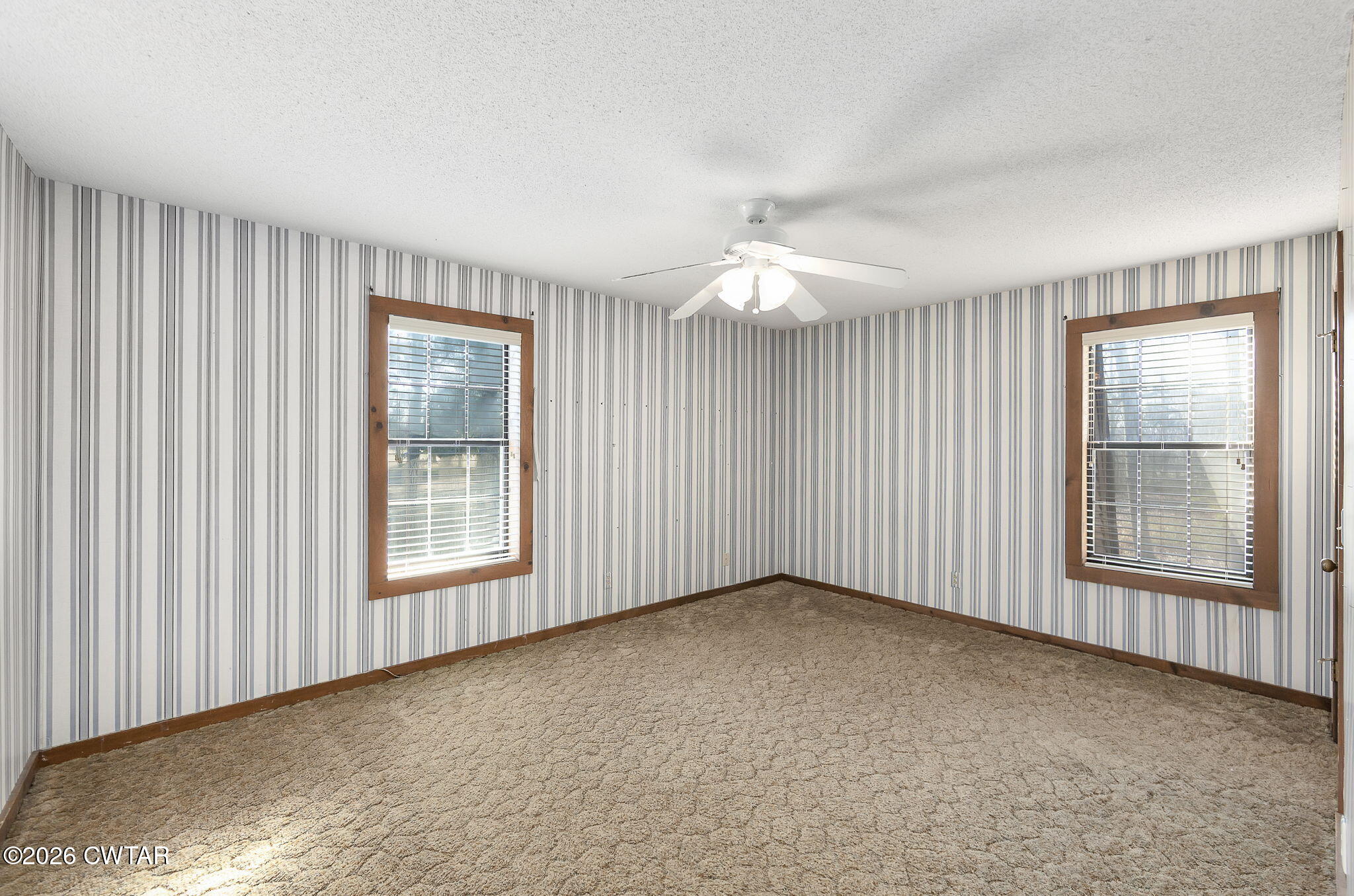 250 Collins Road Dresden, TN 38225 - Photo 7 of 43 an empty room with windows