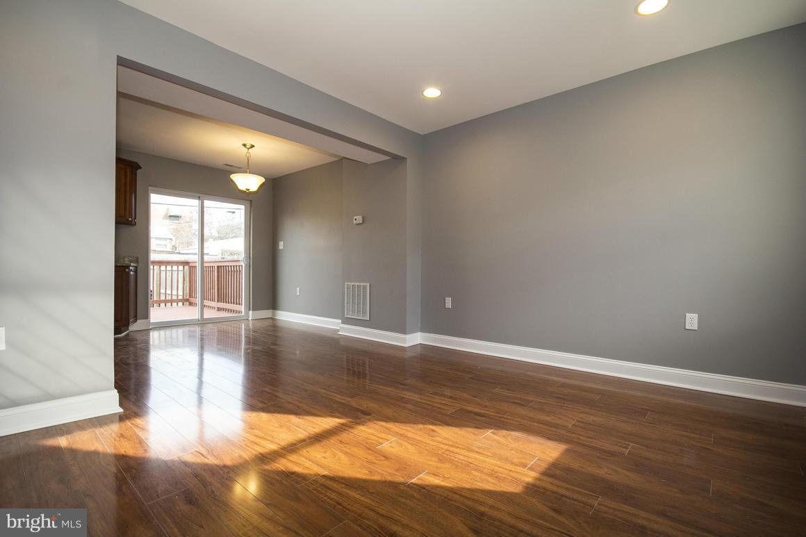 33 Eastship Road Baltimore, MD 21222 - Photo 6 of 23 a view of empty room with wooden floor