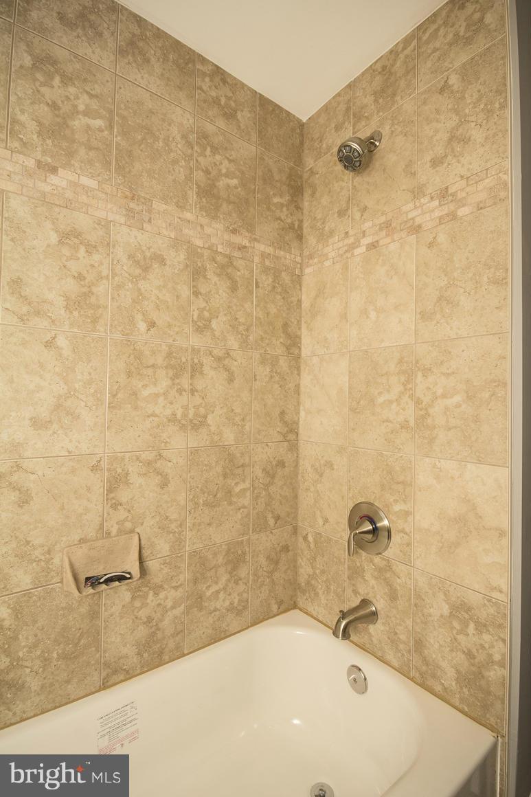 33 Eastship Road Baltimore, MD 21222 - Photo 10 of 23 a bathroom with a bathtub and shower