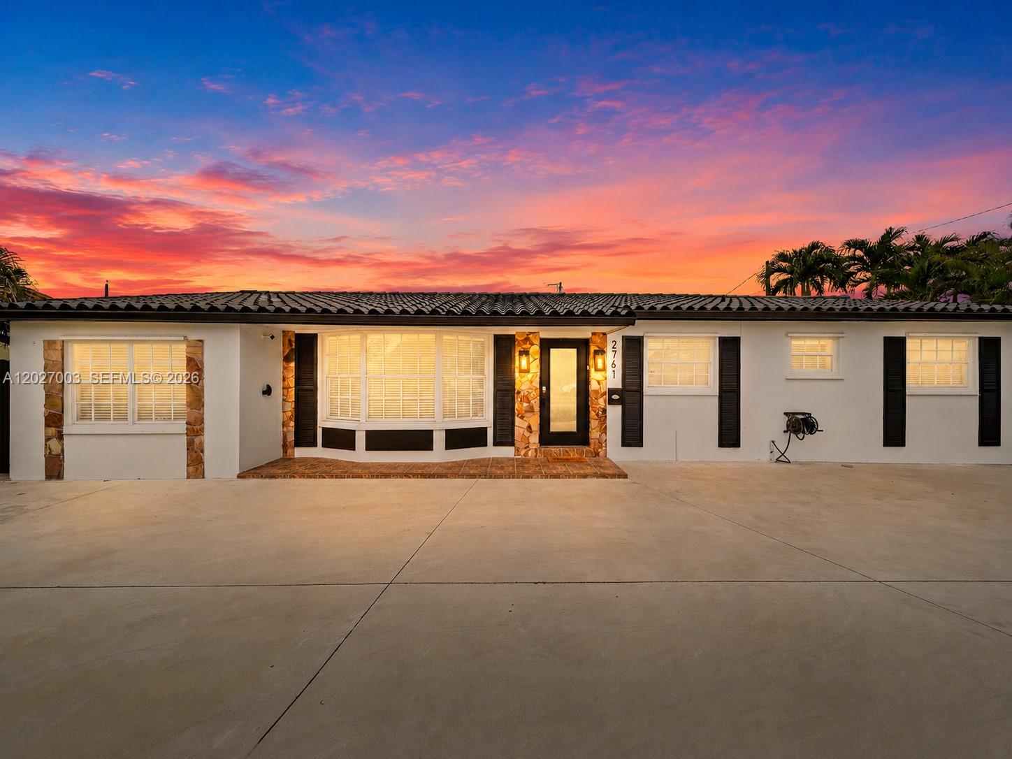 2761 Southwest 92nd Place Miami, FL 33165 - Photo 25 of 37 a view of a house with a patio
