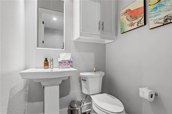 a bathroom with a sink and a toilet