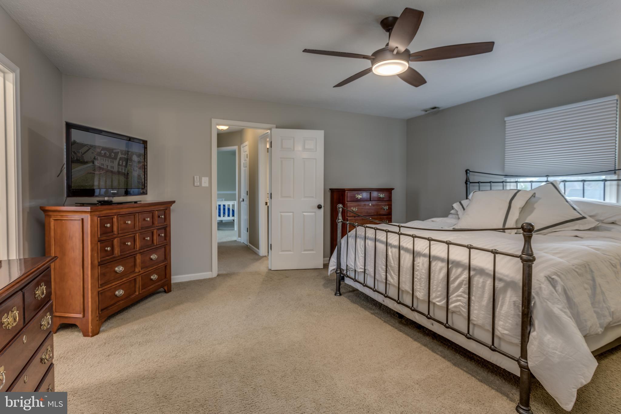 299 Huntersridge Road Winchester, VA 22602 - Photo 18 of 55 Primary Bedroom w/ Ceiling Fan