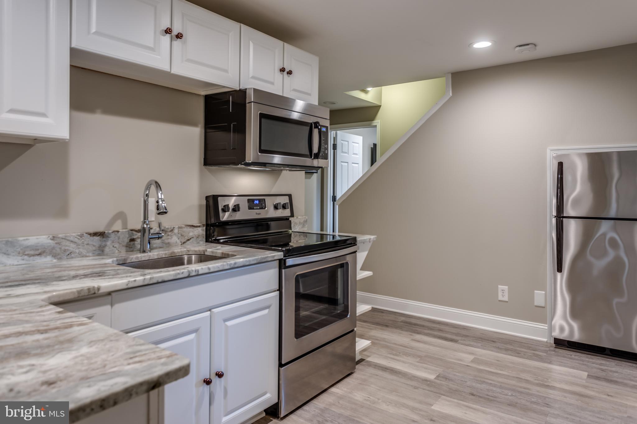 299 Huntersridge Road Winchester, VA 22602 - Photo 35 of 55 Granite Countertops on LL Kitchen