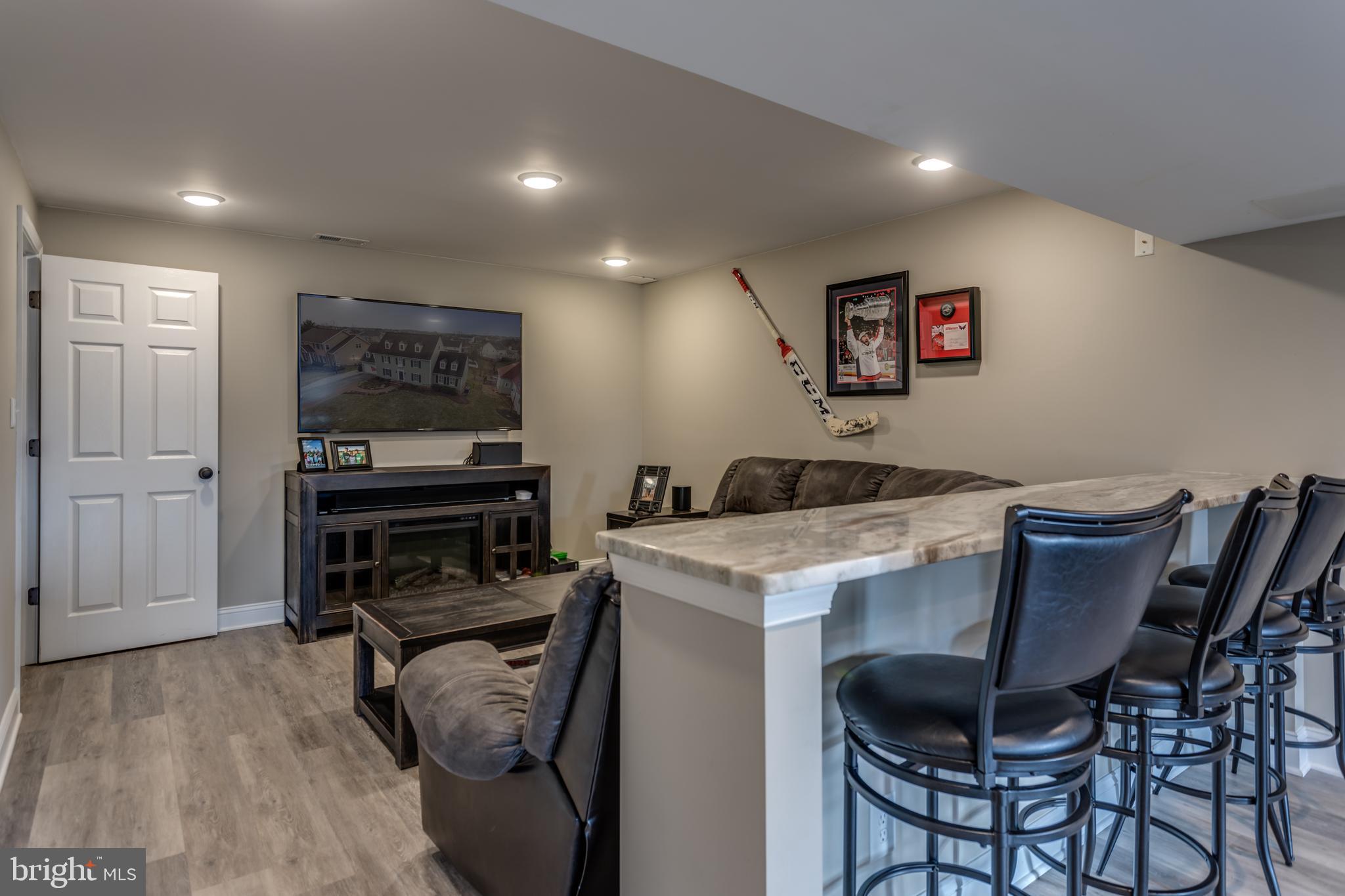 299 Huntersridge Road Winchester, VA 22602 - Photo 37 of 55 Family room w/ Bar seating