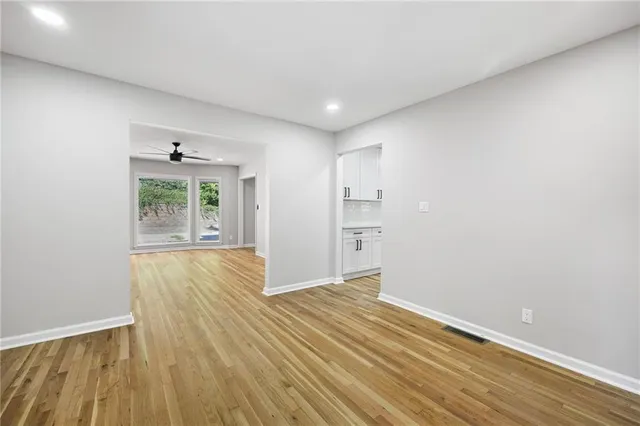 a view of an empty room and window