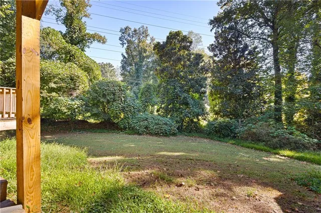 a view of a lake with a yard