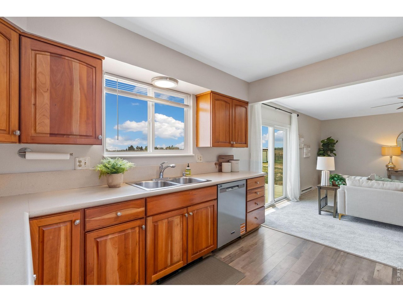 4701 Meining Road Berthoud, CO 80513 - Photo 11 of 31 Kitchen looking into second living area and patio