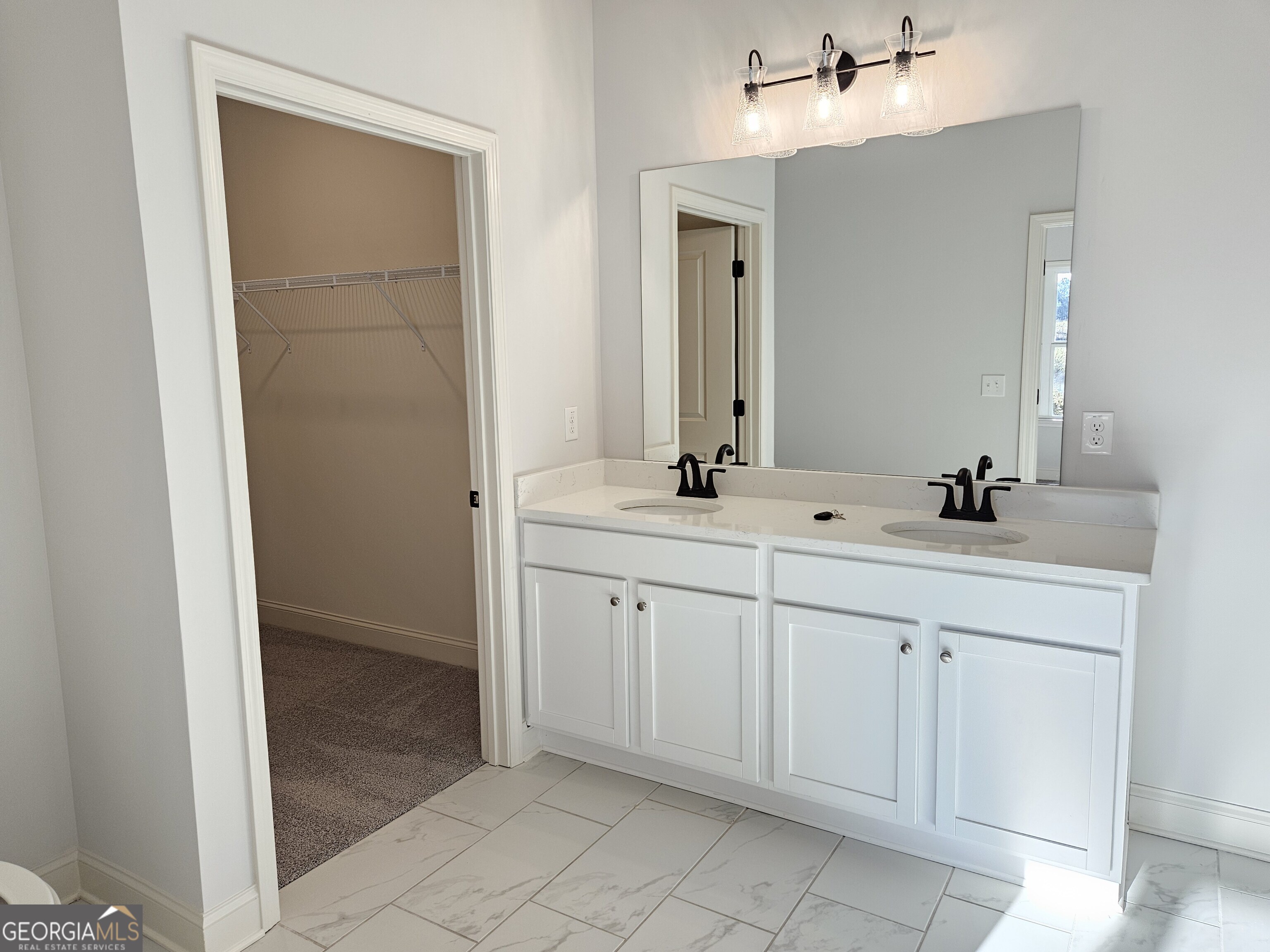 208 Trellis Walk Macon, GA 31220 - Photo 23 of 30 a bathroom with a double vanity sink and a mirror