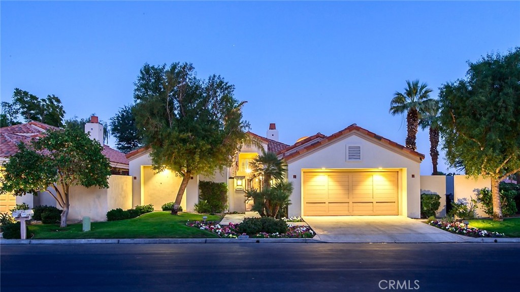 56980 Merion La Quinta, CA 92253 - Photo 13 of 51 a front view of a house with garden