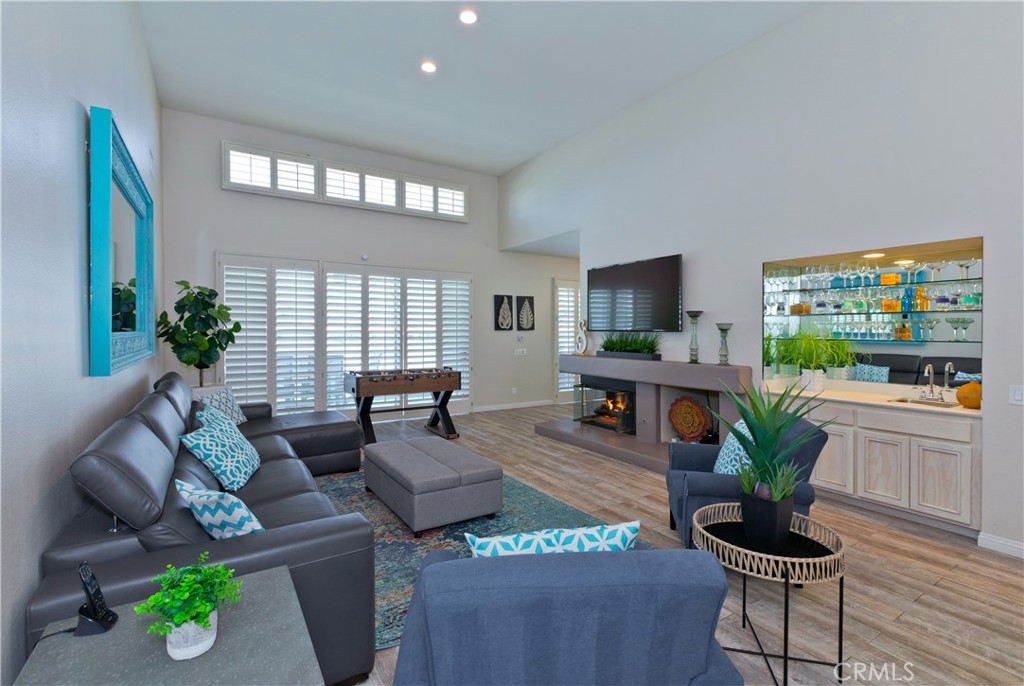56980 Merion La Quinta, CA 92253 - Photo 18 of 51 a living room with furniture potted plant and a large window