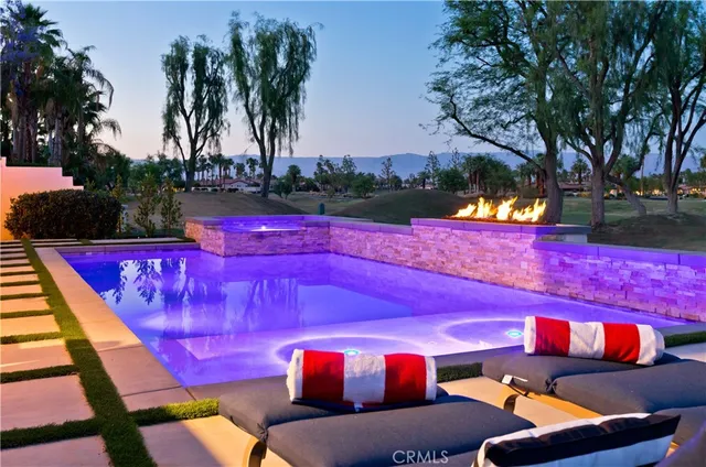 a view of a yard tables and chairs