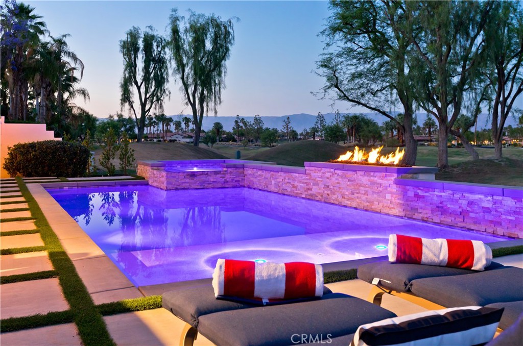 56980 Merion La Quinta, CA 92253 - Photo 2 of 51 a view of a yard tables and chairs