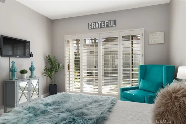 a view of a livingroom with a potted plant